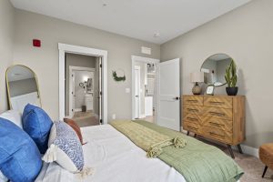 Bedroom with attached en suite bathroom and walk-in closet