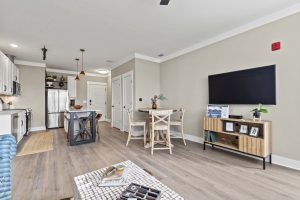 Expansive living room with dining nook and open to kitchen